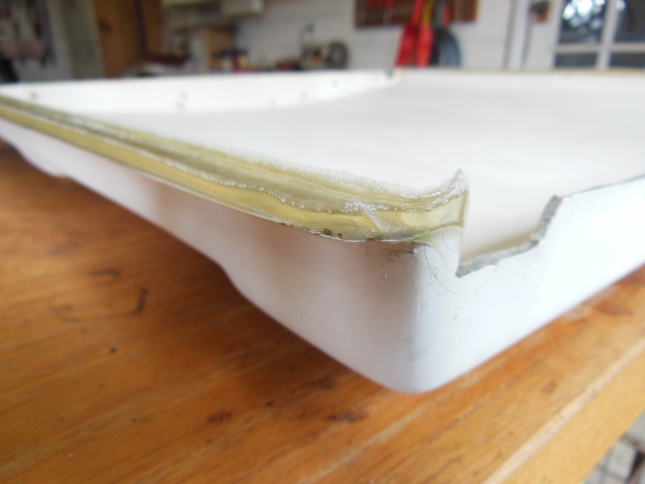 After the epoxy has hardened and the tape removed