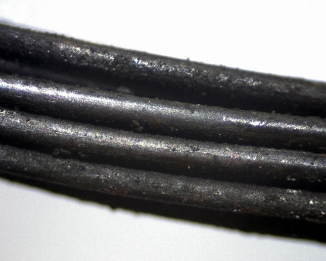 BEFORE - 33 year-old 16 AWG wire at 60x magnification