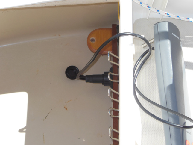 Electrical socket mounted inside the starboard lazarette