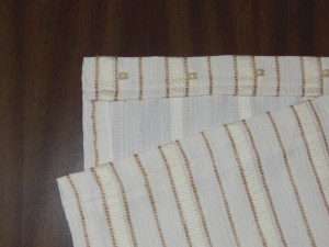 Front and back of one of eight portlight panels