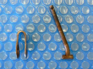 Bent toggle and T bolt from improperly aligned chain plate bolts