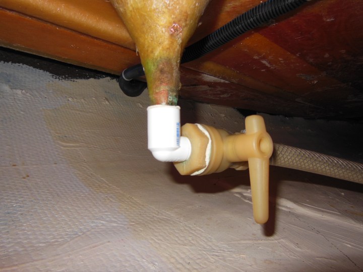 Stop the gray water before it comes out the funnel